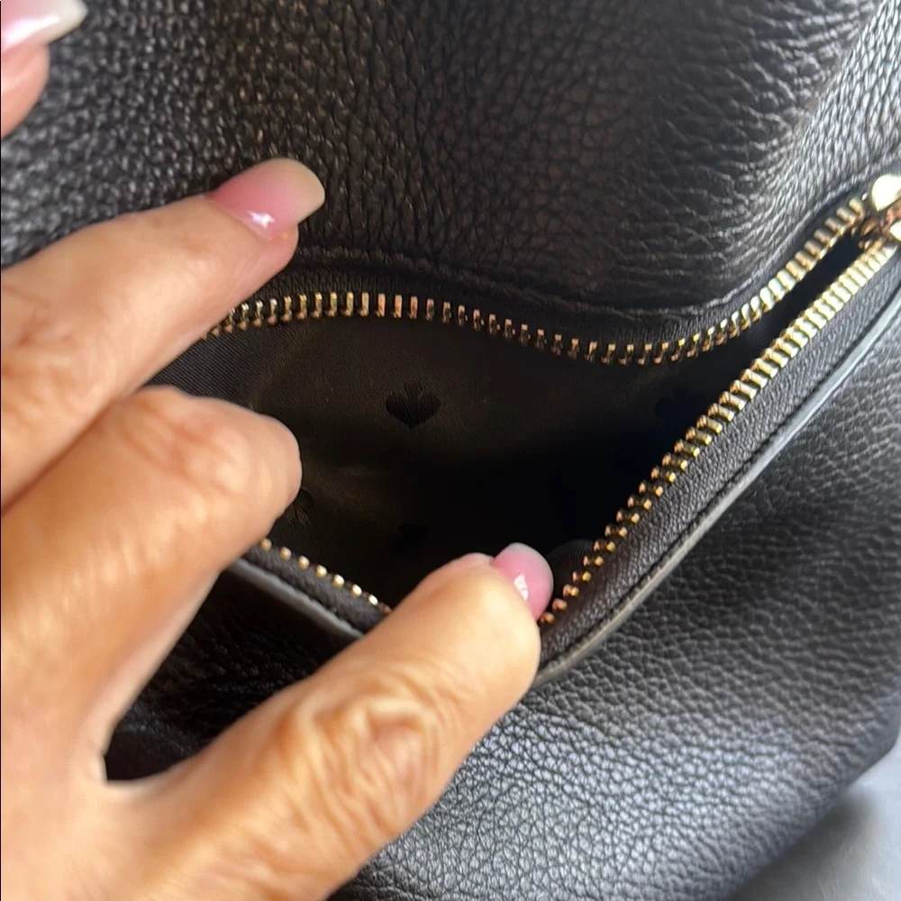 kate spade Black Pebbled Leather Mini Backpack with Gold Accents